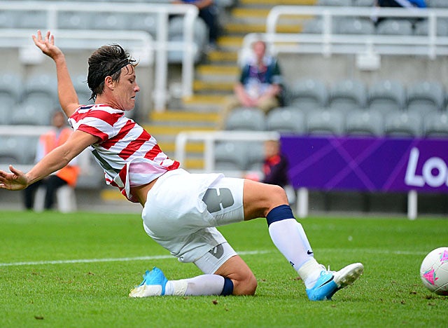 Wambach's sliding goal in the 27th minute gives her four total goals for the tournament. (US Presswire)