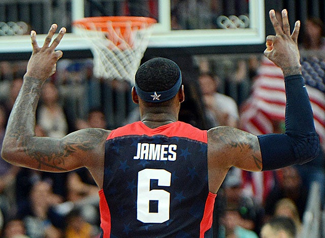 James hits for three of his nine points in the final four minutes vs. Lithuania. (Getty Images)