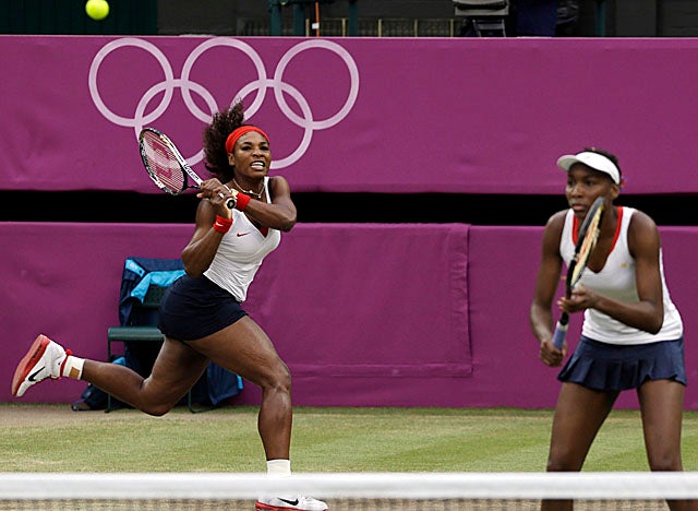 The Williamses didn't drop a set through their five Olympics doubles matches. (AP)
