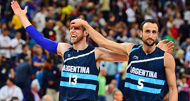 Manu Ginobili (right) and Andres Nocioni celebrate Argentina's trip to the semis for a rematch with the United States. (US Presswire)