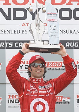 Dario Franchitti celebrates his 25th open-wheel victory and second this season. (Getty Images)
