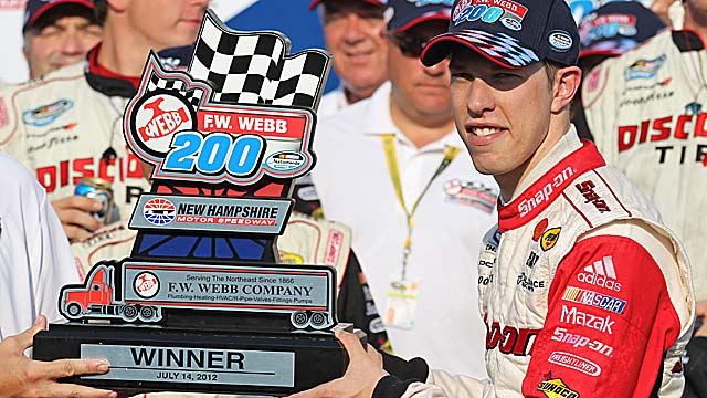 Brad Keselowski passes Kevin Harvick with 21 laps remaining and holds on for the victory. (US Presswire)