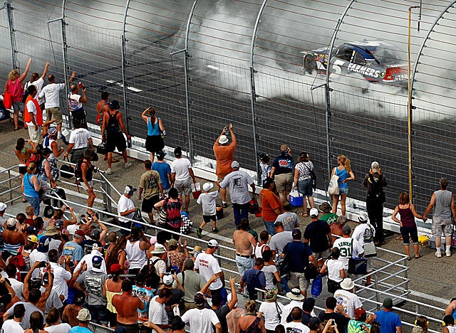 Earning his second victory of the season, Kahne does a burnout for fans at New Hampshire. (Getty Images)