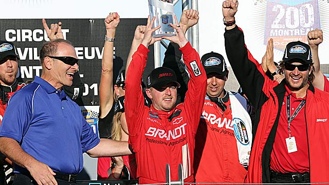 Justin Allgaier (center) celebrates his second 2012 victory with his Turner Motorsports team. (AP)
