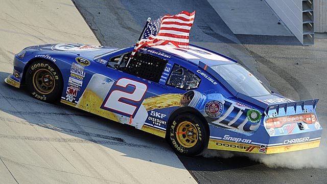 Brad Keselowski gets to do his winning flag ritual for the fifth time this season. (AP)