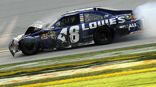 Jimmie Johnson has to finish the race at Talladega in a badly damaged car. (US Presswire)