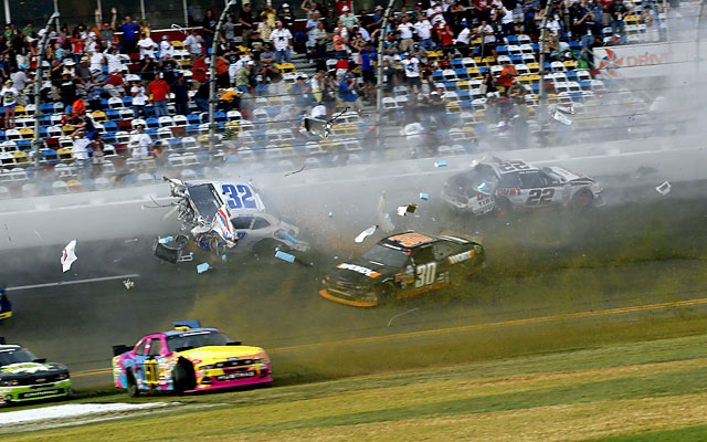 Kyle Larson's car sails dangerously into the fence on the final lap at Daytona. (Getty Images)
