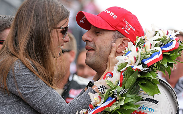 Tony Kanaan celebrates with wife Lauren in Victory Lane after winning the Indianapolis 500. (USATSI)