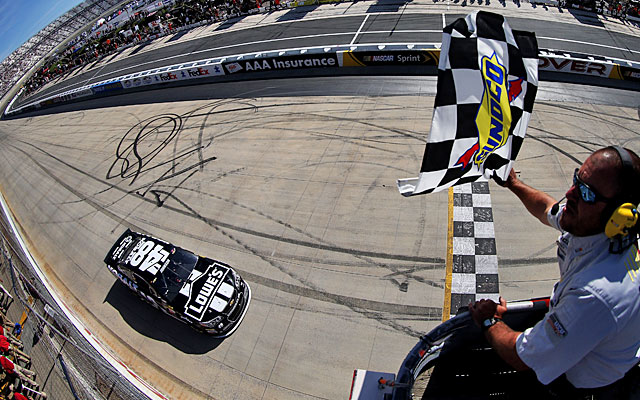 Jimmie Johnson takes the checkered flag at Dover to win back-to-back races for the 13th time. (Getty Images)