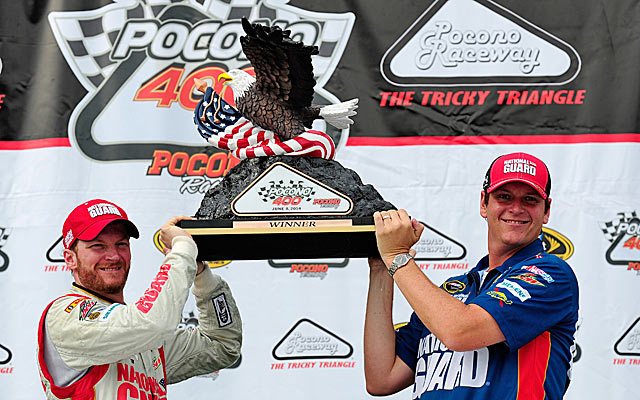 Dale Earnhardt Jr. and crew chief Steve Letarte share the trophy moment. (USATSI)