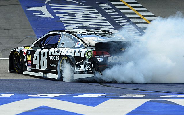 Jimmie Johnson celebrates his first career victory at Michigan. (USATSI)