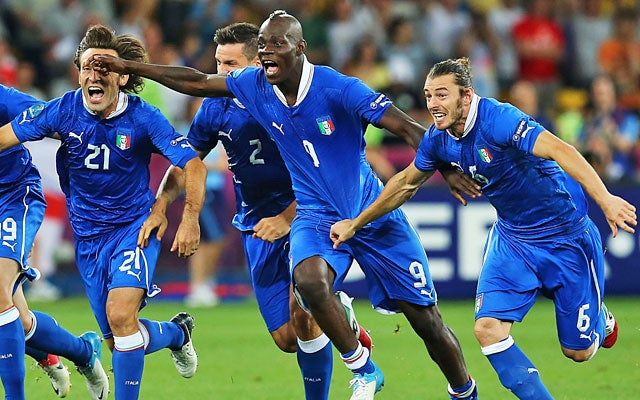 Mario Balotelli (9), one of Italy's PK scorers, and teammates move on the face Germany. (Getty Images)