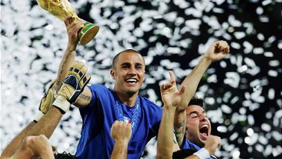 Italy captain Fabio Cannavaro is on top of the world.  (Getty Images)
