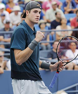 John Isner moves into the third round with a four-set win over Marco Chiudinelli. (AP)
