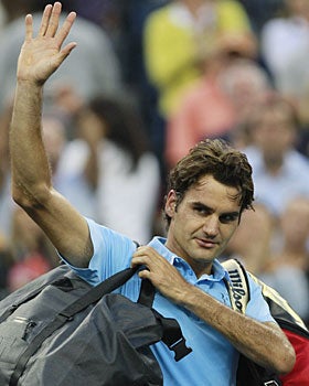 'I would have loved to play against [Nadal] here.' Federer says. 'We'll never know how it would have gone.' (AP)