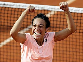 Francesca Schiavone takes another joyous step in defending her French Open title. (AP)