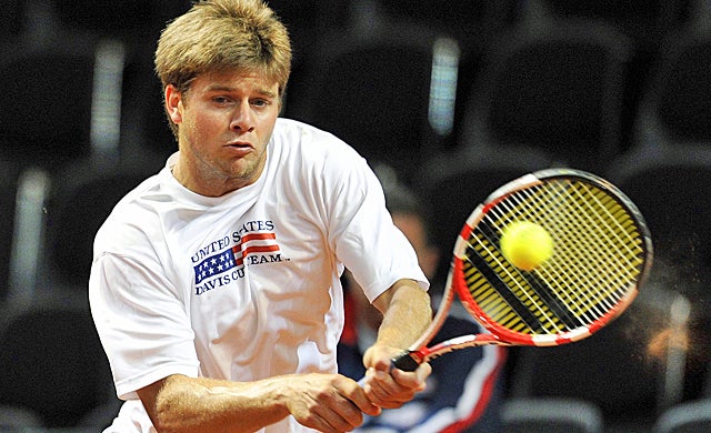 Ryan Harrison's practice pays off, beating Michael Lammer in straight sets in his Davis Cup debut. (AP)