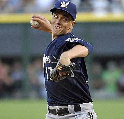 Zack Greinke is brilliant, allowing just three hits through nine scoreless innings to record his eighth win of the year.  (Getty Images)