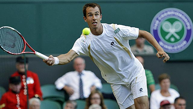 Lukas Rosol plays near flawless tennis, serving, returning and at the net. (AP)