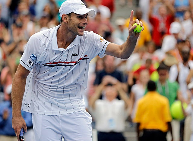 Roddick stays one match ahead of retirement after beating Italy's Fabio Fognini. (AP)