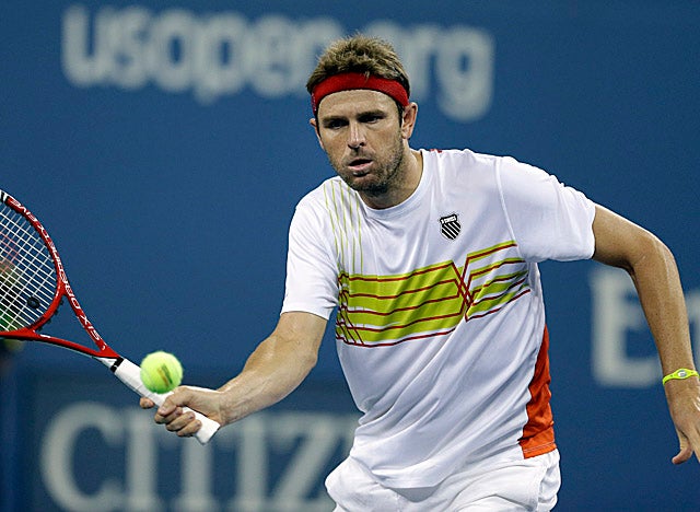 Fish, here winning his third-round match, withdrew from the U.S. Open Monday. (AP)