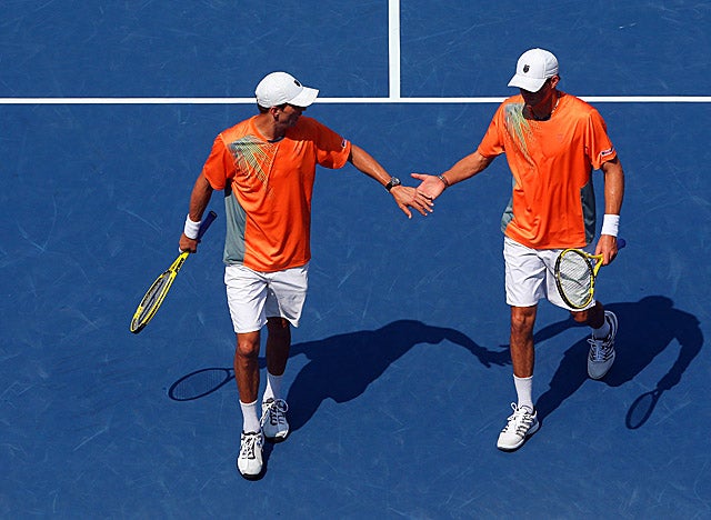 Stuck at 11 major titles since 2011's Wimbledon, Bob and Mike Bryan finally break the record. (Getty Images)