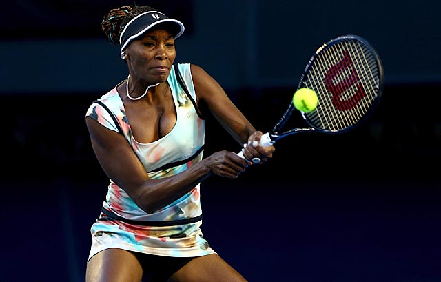 Despite a sore ankle, Venus Williams makes quick work of Garbine Muguruza. (Getty Images)