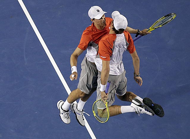The Bryan twins celebrate their doubles win over Robin Haase and Igor Sijsling in Melbourne. (AP)