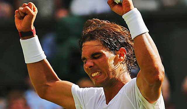 Rafael Nadal celebrates after capturing his first-round match at Wimbledon. (Getty Images)