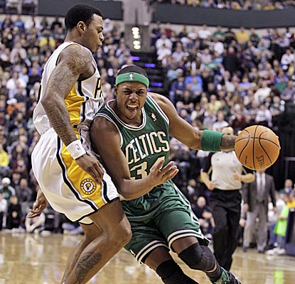 Paul Pierce drives on Pacers guard Brandon Rush, and finishes with 21 points in a Celtics' win. (AP)