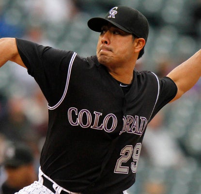 Jorge De La Rosa's season is over after tearing the ulnar collateral ligament in his pitching arm. (AP)