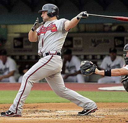 Dan Uggla extends his streak to 31 games and is four away from tying the longest streak by a second baseman at 35.  (Getty Images)