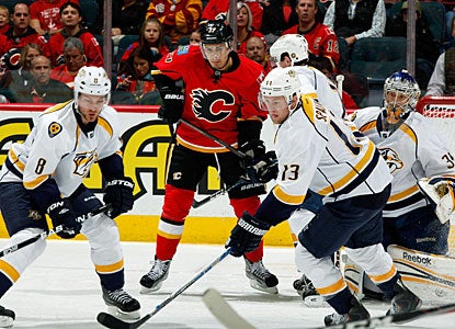 Pekka Rinne does his best to keep a clear vision on where the puck is to eventually earn his 21st career shutout. (AP)
