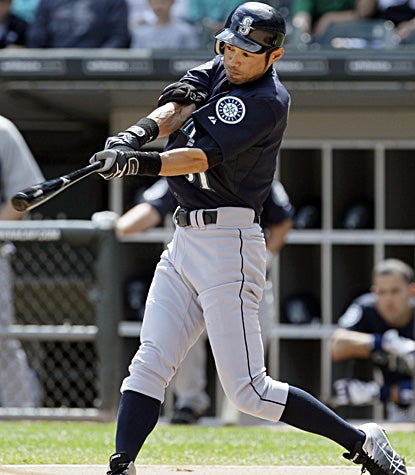 Ichiro Suzuki homers twice against the White Sox, ending Chicago's nine-game winning streak. (AP)