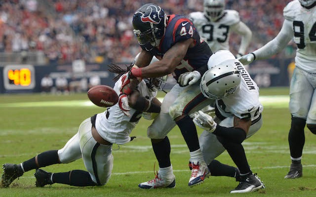 Texans fans booed plays like this Ben Tate fumble, which led to Tate calling them 'wishy-washy.' (USATSI)