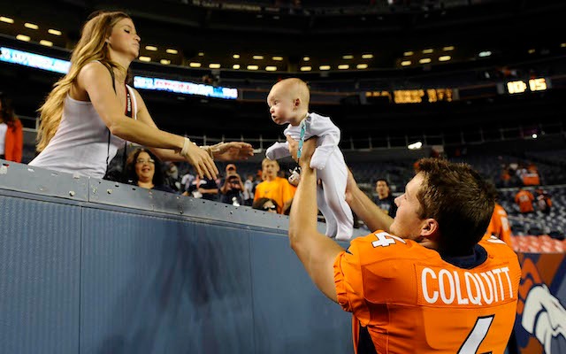 Britton Colquitt has been bringing babies to football games since 2012. (USATSI)