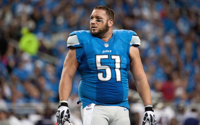 Dominic Raiola tried to cut block someone on a play where the Lions took a knee. (USATSI)