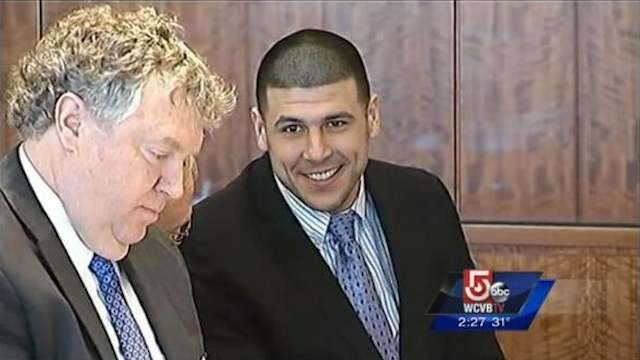 Hernandez was all smiles in court on Feb. 7. (Twitter/@WesleyLowery)