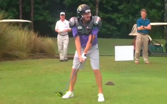 VIDEO: Jags kicker tries to hit golf ball wearing helmet and