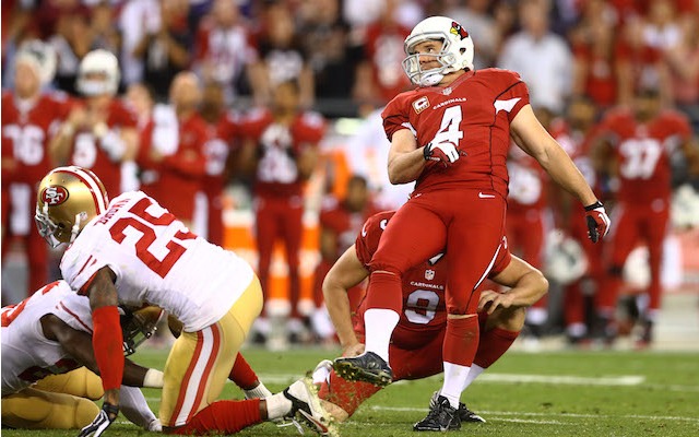 Arizona Cardinals kicker Jay Feely celebrates kicking the winning