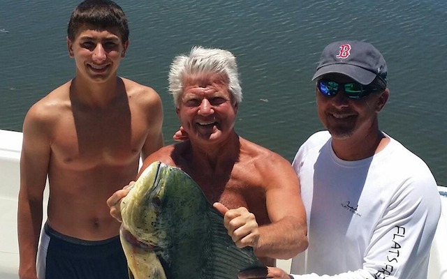 PHOTO: Shirtless Jimmy Johnson and Urban Meyer with a big fish