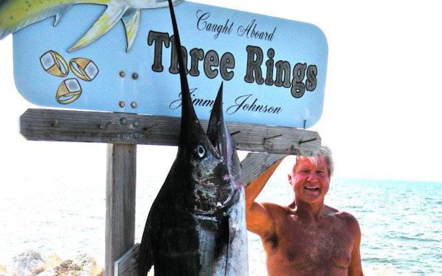 LOOK: Shirtless Jimmy Johnson posing with giant blue marlin 