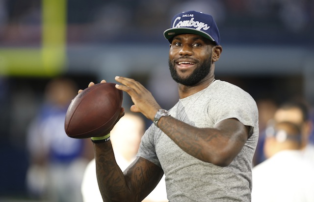 LeBron James appears to be a natural with a football. (USATSI)