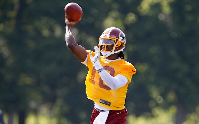 Robert Griffin III hurt as Redskins edge Ravens in OT