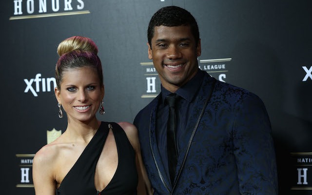 Russell Wilson and his wife Ashton in February 2013. (USATSI)