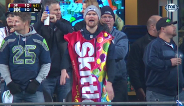 Marshawn Lynch Signs New Contract With Seattle Seahawks, Skittles For  Everyone - Revenge of the Birds