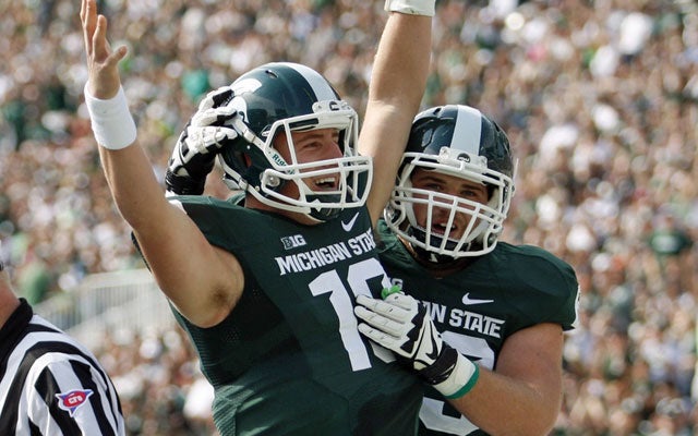 Connor Cook won over his teammates while impressing scouts in 2014. (USATSI)