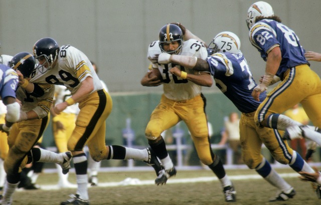 Deacon Jones takes down Franco Harris in 1973. (Getty Images)