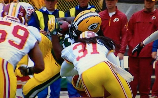 This hit by Brandon Meriweather knocked Eddie Lacy out of the game. (FOX)