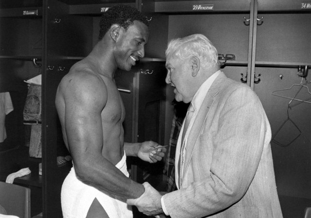 Former Indianapolis owner Bob Irsay congratulates Eric Dickerson after a game in November 1987. (Getty Images)
